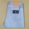 Nuevos jeans rectos finos de corte holgado para hombre para primavera y verano, absorbentes del sudor, transpirables, azul claro, pantalones largos casuales versátiles