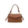 La popular bolsa cuadrada pequeña fresca de mano para mujer de este año, nuevo estilo otoño 2026 con lunares, bolsa de hombro única de lujo ligero, bolsa cruzada para ir al trabajo