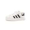 Zapatillas infantiles con puntera de concha 2026 otoño e invierno nuevas versátiles ligeras de suela blanda zapatos casuales para niños y zapatillas deportivas de moda para niñas