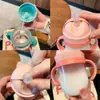 Taza de Agua Taza de Aprendizaje para Beber con Popote para Niños Taza Graduada para Bebé de un Año Botella de Agua Portátil Botella de Leche con Bola de Gravedad Linda