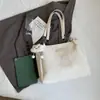 Nuevos bolsos de mano para otoño e invierno, bolsos tote versátiles, bolsos de hombro de gran capacidad, estilo simple y de lujo ligero, bolsos casuales para el día a día con un tacto de calidad