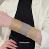 Estilo europeu e americano, pulseira de metal trançado com punho aberto única, apresentando um design exagerado e de nicho, nova joia da moda 2026
