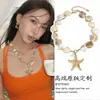 Collar Asimétrico de Concha con Estrella de Mar Dorada Estilo Resort para Mujer 2025 Nuevo Collar para Clavícula Lujo Accesible Accesorios de Isla
