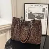 Comércio Exterior Transfronteiriço Mais Vendido Bolsa de Mão em Camurça Moda Feminina Design de Nicho Bolsa Tote de Ombro para Estudante Universitário
