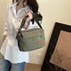 Bolsa Transversal Casual de Comércio Exterior para Homens 2026 Novo Modelo Simples para o Dia a Dia Bolsa de Lona Moda Simples de Viagem Cor Sólida Bolsa de Ombro