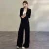 Conjunto feminino estiloso 2026 outono novo elegante emagrecedor conjunto falso de duas peças com top de manga longa de cor contrastante e calça de perna larga