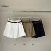 Shorts largos de comprimento 3/4, de cintura alta, que cobrem os quadris e afinam o corpo, para mulheres, novo estilo da primavera de 2026, estilo old money, shorts de terno preto e branco minimalista francês