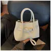 Estilo Novo Primavera e Verão Fresco e Estiloso Moda Coreana Bolsa de Mão Cesta de Piquenique Bolsa Tote Bolsa Transversal Versátil de Nicho para o Dia a Dia para Mulheres