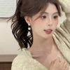 Pendientes elegantes de lujo con forma de bola de perla y diamante para mujer, con diseño de nicho de aguja de plata S925, para usar en la parte delantera y trasera.
