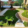 Piedra de afilar con agua Piedra molida Raspado de piedra Piedra lavada con agua Material de pared de terrazo Piedra de colores especiales Grava de hueso