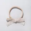 Accesorios para el cabello para niños europeos y americanos, banda para el cabello de encaje súper linda sin costuras para bebés, diadema de luna llena Hundred Rizhao para bebés