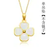 Nuevo trébol de cuatro hojas bañado en oro 24k incrustaciones de corazón de calcedonia Hetian Bi simulada calcedonia blanca colgante para mujer