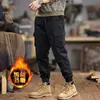 Nueva colección primavera 2026: Pantalones cargo de alta gama, modernos y de corte ajustado para hombre, con un corte holgado, múltiples bolsillos y un diseño casual negro, adecuados para primavera y otoño