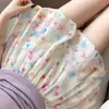 Saia Larga de Cintura Alta Fluida para Roupa de Exterior 2026 Nova Saia-Calça Curta Floral Colorida para Mulheres Verão Doce Estilo de Perna Larga