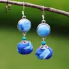 Pendientes de Teñido con Nudo de Yunnan Artístico Creativo Puesto Étnico Yunnan Dali Teñido con Nudo Tinte Azul Flor de Viaje Auricular Taibao