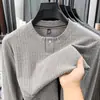 Sudadera de cuello redondo para hombre Tencel Lana 2026 Otoño Nueva Moda Casual Versátil Botón de Presión Capa Base Sudadera para Hombre