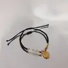 Piedra ojo de gato placa dorada de la suerte este año cuentas de buena suerte cuerda roja tejida pulsera de la paz regalo de nicho cuerda para la mano hombres y mujeres