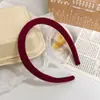 Diadema de esponja roja de estilo Año Nuevo, diadema de cuero de alta calidad con parte superior craneal alta, accesorios para el cabello para mujer, nuevos y sencillos que combinan con todo.