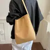 Bolso de mujer de gran capacidad, nuevo y moderno de 2026, popular de verano, bolso de hombro de patrón tejido de alta gama, bolso tote para el trabajo