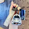Original mochila escolar con luz oso astronauta llavero caricatura astronauta luminoso pareja mochila colgante regalo pequeño