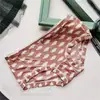 [80-120] 524 Seda de Hielo estampado lindo tiro bajo bolsa de ropa interior para mujer cadera con taladro ropa interior para mujer tiro bajo