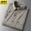 Verano nuevo camisa de solapa para hombre suelta color liso moda blusa de Tencel botón bordado manga corta fina 2095