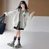 Abrigo para Niñas Primavera y Otoño 2026 Nuevo Estilo Infantil Otoño Casual Holgado Sudadera con Capucha Elegante para Niños Mayores