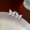 Pendientes de mariposa de circonita estilo frío con clip para oreja pequeña, a la moda, combinables, elegantes, ligeros y de lujo, nuevos pendientes para mujer, venta al por mayor