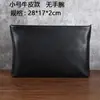 Fábrica directa de Guangzhou bolso de mano para hombre bolso de mano horizontal de cuero bolso de mano cabeza de cierre piel de oveja bolsa de negocios casual