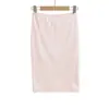 Conjunto de três peças estilo francês: camiseta de manga longa com cardigã de desejo puro + top tipo camisola + saia evasê de cintura alta elástica