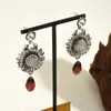 Pendientes florales de plata vintage transfronterizos europeos y americanos con un diseño geométrico de alta gama, versátiles para la moda de verano y el uso diario, para mujer