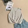 Chaleco de punto de estilo coreano de cuello redondo, cinco botones, hilo floral, top corto de capas moderno, versátil