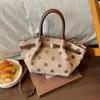 Bolsa de mão feminina de alta qualidade transfronteiriça, nova coleção de outono 2026, bolsa de ombro/bolsa transversal casual de bolinhas grandes