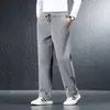 Pantalones de chándal gruesos y forrados de forro polar para hombre para otoño e invierno, adecuados para hombres de mediana edad, corte holgado, talla grande, pantalones casuales de pierna recta