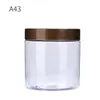 Frasco de plástico alimentario de fábrica transparente té perfumado fruta seca caramelo sellado botella de plástico PET de boca ancha cubo de plástico para galletas