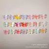 Rhinestones para Uñas Artísticas 3D de Mariposa Transfronterizos, Multicolor, Sencillos y Lindos, Tamaño Pequeño, 32 Estilos, Decoraciones para Uñas Termoencogibles en Forma de Moño