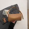 Bolso pequeño versátil y elegante de alta costura transfronterizo para mujer, nuevo modelo 2026, bolso de hombro y bandolera casual ligero de alta gama