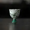 Taza de té de cerámica para té con orquídea pintada a mano de estilo antiguo, con pie alto y boca de flor para beber té