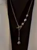 Escaso Collar de Perlas Naturales Barrocas Moradas Elegante Lujo Ligero Francés Largo 2021 Nuevo Cadena de Lana en Forma de Y
