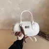 Bolsa Pequeña de Mano para Jugador de Bolos Transfronterizo para Mujer 2026 Nueva Versátil Textura Bolso de Hombro Único Bolso Cruzado Boston