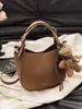 Bolso de Cubo de Mano de Nicho Transfronterizo para Mujer 2026 Nueva Moda Retro Bolso de Hombro Único Bolso Cruzado Casual para Viajes