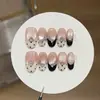Uñas postizas hechas a mano estilo [miu dulzura] lunares retro punta francesa nudo de mariposa pedrería ojo de gato rosa