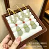Colgantes de calabaza de jade Dongling naturales, de múltiples estilos, con jade Dongling de color agua transparente, pequeños colgantes de calabaza que simbolizan la buena fortuna y la prosperidad, y colgantes de jade Dongling de colores claros