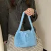 Nuevo bolso tote casual 2026 para el uso diario, estilo coreano, bolso de mano de punto chic y versátil
