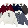 Cardigã de tricô com gola Peter Pan e laço estilo college para mulheres, jaqueta suéter versátil estilo coreano para outono/inverno, top curto