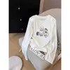 Estilo novo de 2026, ombro normal, gola redonda, camiseta feminina de algodão com estampa de floco de neve, manga longa, moderna e estilosa, top que rejuvenesce, peça básica para o início do outono