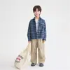 Nueva colección de otoño Haima 2026 ropa infantil para niños moda de otoño estilo universitario camisa a cuadros camisa cepillada versión coreana