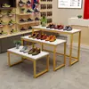 Mesa de exhibición alta y baja de tienda de ropa mesa de agua que fluye mesa de isla dorada estante de exhibición de floristería estante para zapatos de centro comercial estante de exhibición de bolsos