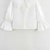 Nova Camisa Branca de Manga Longa Doce de Primavera Design de Cardigan com Gola de Boneca Feminina Top Chique de Nicho