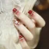 Armadura de mano sentido avanzado hecho a mano ins explosiones diamante roto mariposa uña piezas de uña al por mayor uñas portátiles